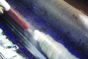 Dry Ice blast cleaning is used to clean ink from printing rress rollers